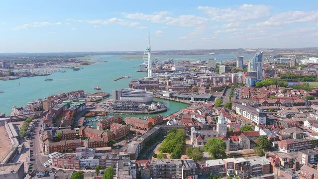 Portsmouth, UK: Aerial view of famous port city in England, skyline of city center with Spinnaker Tower - landscape panorama of United Kingdom from above - Powered by Adobe
