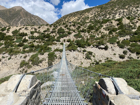 suspension bridge in the Himalayas mountains Nepal