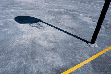 basketball hoop silhouette on the court, sports equipment