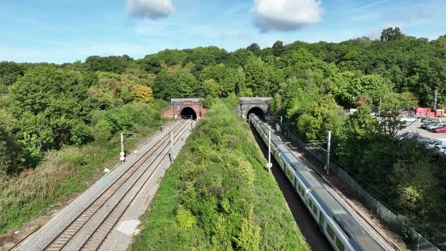Fast Commuter Train Entering a Tunnel