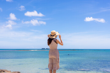 Travel woman go to the beach in Penghu of Taiwan