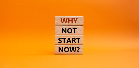 Why not start now symbol. Concept words Why not start now on wooden blocks. Beautiful orange background. Business and Why not start now concept. Copy space.