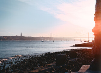 sunset over tagus river in lisbon Portugal