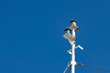Position lights on the mast of a ship