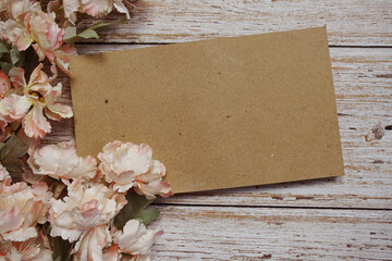 Obraz premium Space for copy background and flower decoration on wooden background