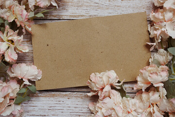 Space for copy background and flower decoration on wooden background