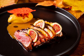 duck with fig and pumpkin puree