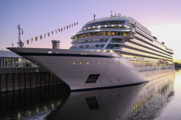 Viking cruiseship or cruise ship liner Star in port of Montreal, Canada during sunrise before...