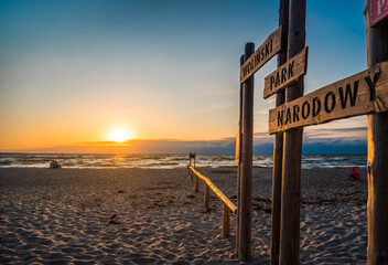 Sunset over the Baltic Sea. Entrance to the Wolin National Park (Polish: Woliński Park Narodowy). Poland