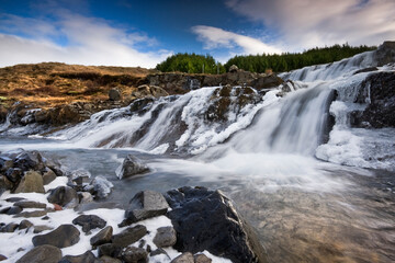 waterfall in the mountains, Iceland