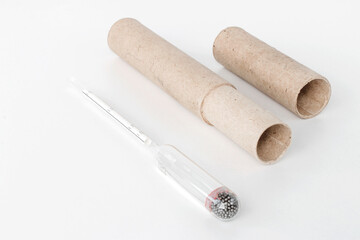 hydrometer, a tool for measuring the density of the battery electrolyte, on a white background