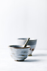 Traditional, handcrafted ceramic on bright background. Soft focus. Copy space.	