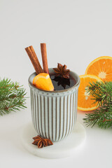 Christmas mulled wine. Punch, grog. The drink is decorated with an orange slice, anise and cinnamon.
