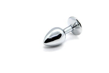 A metal stopper on a white background
