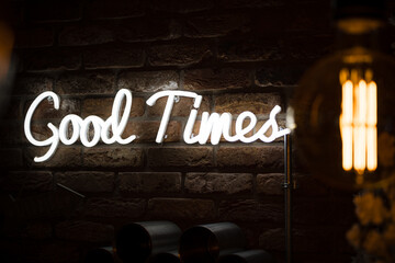 Good times neon sign lit up bright