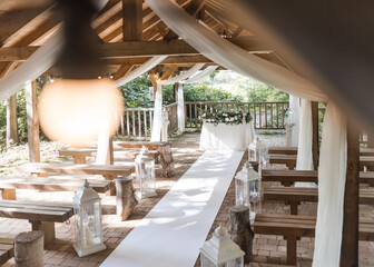 Beautiful outdoor setting for romantic wedding ceremony surrounded by woodland countryside