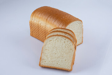 whole wheat bread slices on a white background