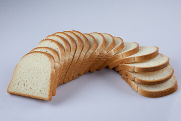 whole wheat bread slices on a white background