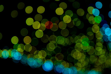 Blue Green Defocus Abstract bokeh light effects on the night black background texture