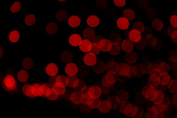Red Defocus Abstract bokeh light effects on the night black background texture