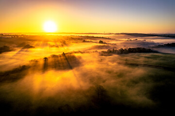 Fototapeta na wymiar Misty Sunrise
