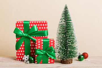 Christmas composition. craft Gift box, small tree, branches and craft DIY decorations on white background. New year concept. Christmas home decoration Flat lay, top view, copy space