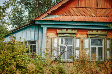 Fototapeta na wymiar Old wooden house in the Russian village. Russian hut.