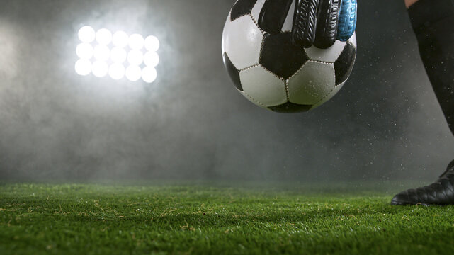 Close-up of Football Goalkeeper Holding Soccer Ball
