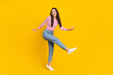 Full length photo of pretty lady rejoice purchase new footwear big big black friday sale look empty isolated on yellow color background