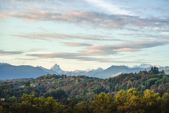 Pic du Midi d'Ossau from the Boulevard des Pyrénées in Pau, with first snow and fall's colors of October