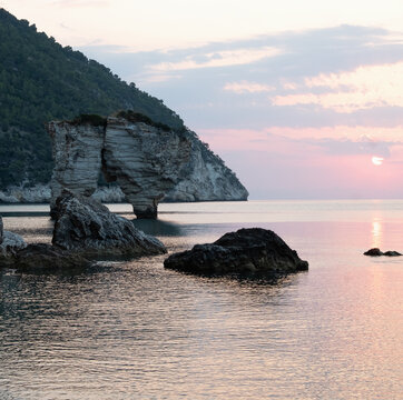 Italy, Apulia, Gargano, Baia Delle Zagare, Rock formations on coast of Adriatic Sea