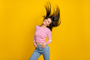 Photo of nice good mood girlish woman with long hairdo dressed striped top jeans hands in pockets...