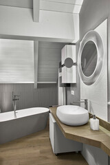 interior view of a modern bathroom in the attic room