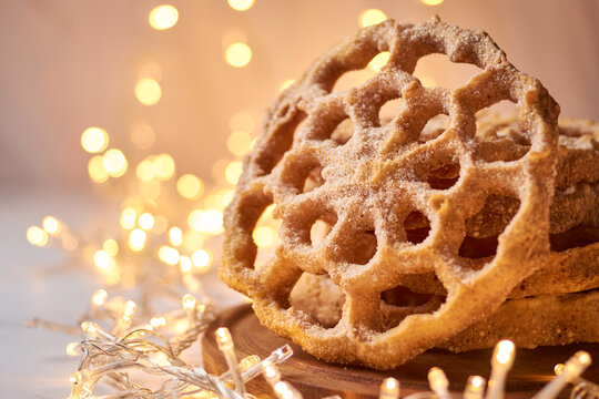 Typical Mexican Christmas sweet called "Bu&ntilde;uelo de viento" or Culler. Selective focus.