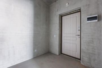 interior of the apartment without decoration in gray colors
