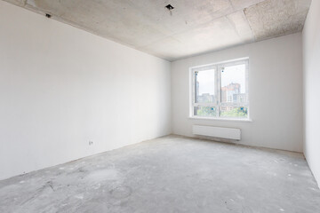 interior of the apartment without decoration in gray colors