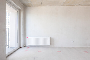 interior of the apartment without decoration in gray colors