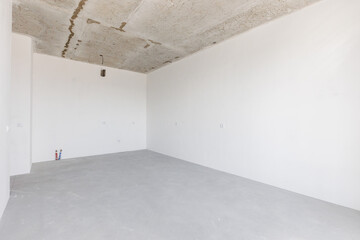 interior of the apartment without decoration in gray colors