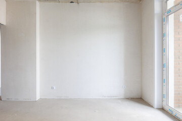 interior of the apartment without decoration in gray colors