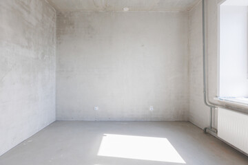 interior of the apartment without decoration in gray colors