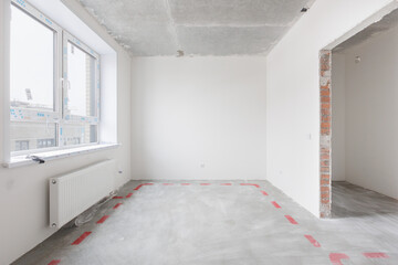 interior of the apartment without decoration in gray colors