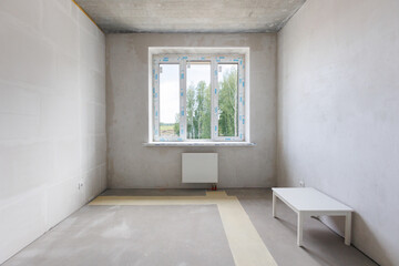 interior of the apartment without decoration in gray colors