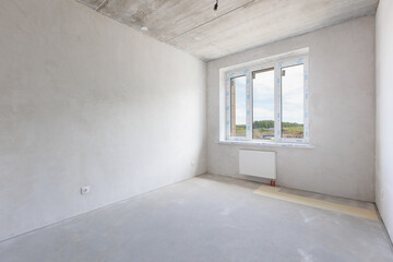 interior of the apartment without decoration in gray colors