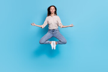 Full body photo of lady rest wear shirt jeans sneakers isolated on blue color background