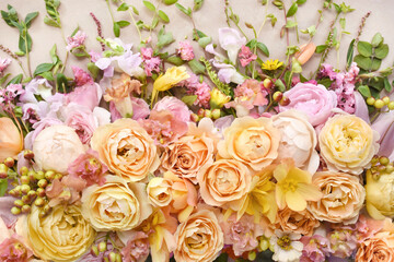 Delicate blooming festive light pink roses and bright flowers, blossoming rose flower background, bouquet floral card, selective focus, shallow DOF	