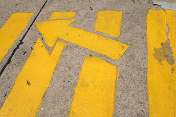 Fototapeta premium yellow arrow sign