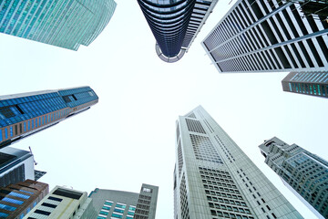 View of the office buildings in the financial district in Singapore.  - obrazy, fototapety, plakaty