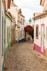 Colorful and flowery streets of the village of Ferragudo, Algarve, Portugal