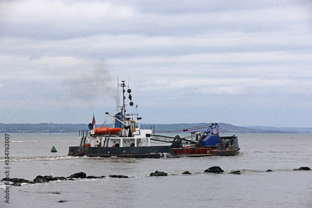 Wall mural dredger working on the river teign, teignmouth