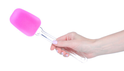 Pink silicone spatula in hand on white background isolation